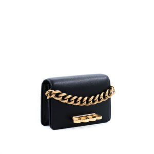 Alexander McQueen Four Ring Mini Chain Bag in black leather with gold-tone hardware and chain strap.