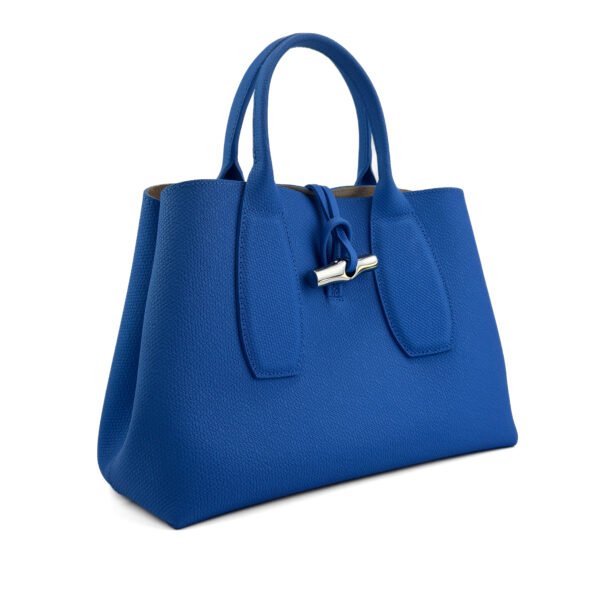 Longchamp Roseau Top Handle Bag in vibrant blue leather with silver-tone hardware.
