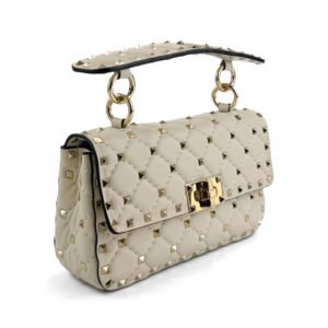 Valentino Garavani Rockstud Spike Shoulder Bag in ivory leather with gold-tone Rockstud detailing.